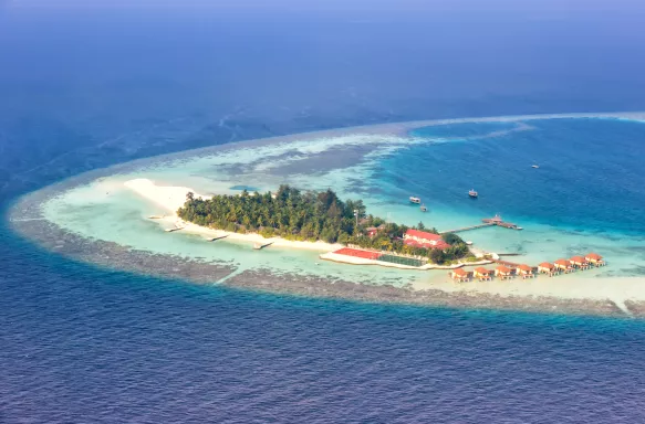 Maayafushi Resort paradise island, surrounded by blue waters, Maldives