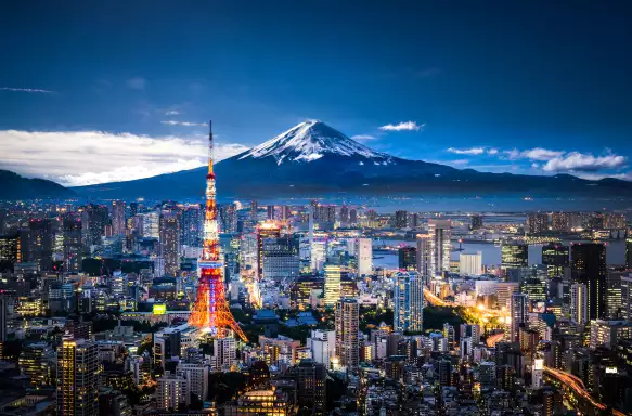 Tokyo evening skyline with Mt. Fuji in the background.