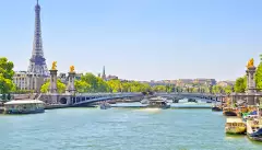 The Seine river with Alexandre III bridge and Eiffel Tower in the background