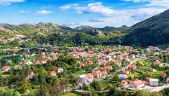 Aerial shot of country houses in Cetinje city, Montenegro