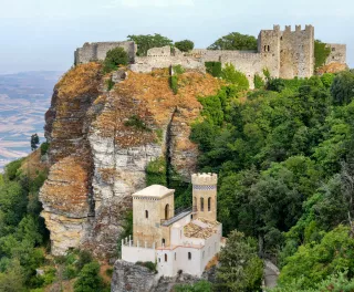 Historic Fort and lush vegetation on rocky clifftop in Erice, Sicily, Italy
