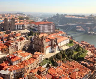 An aerial shot of the Porto Cathedrals next to the Douro River, Portugal
